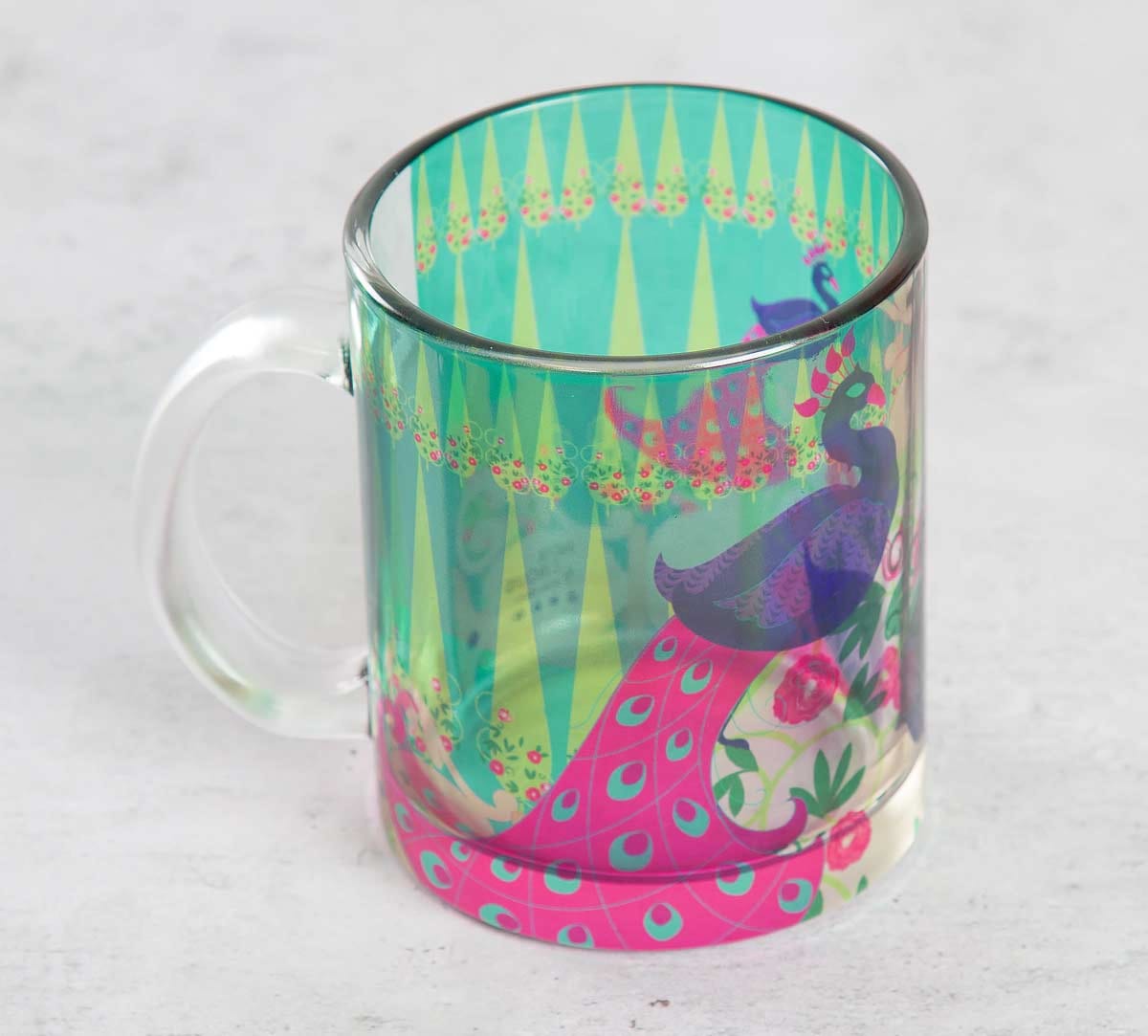 Conifer and Peacock Illusion Glass Coffee Mug