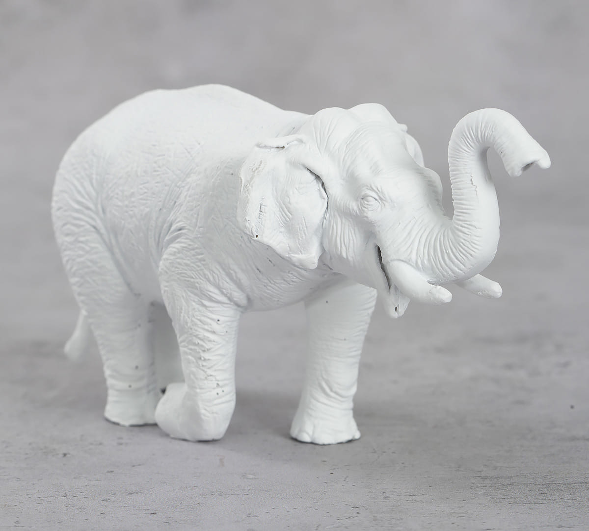 White Baby Tusker Figurine