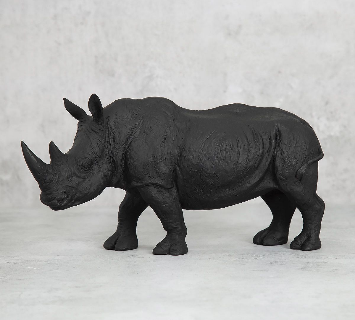 India Circus Black Rhino Calf Figurine