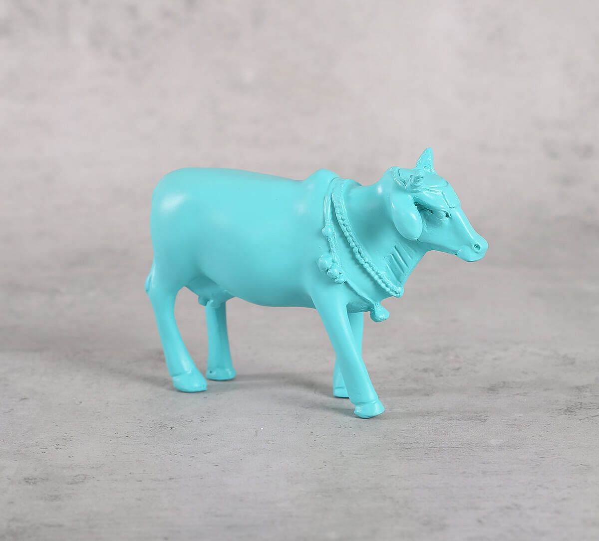 India Circus Cerulean Cow Figurine