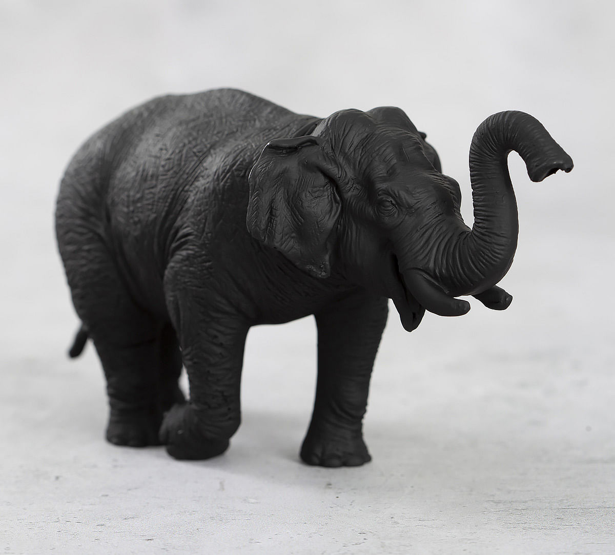 India Circus Black Baby Tusker Figurine