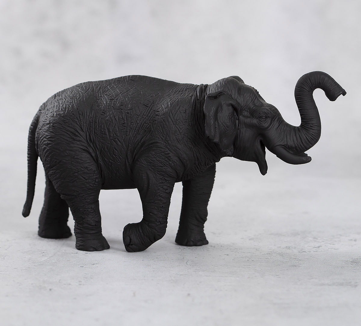 India Circus Black Baby Tusker Figurine