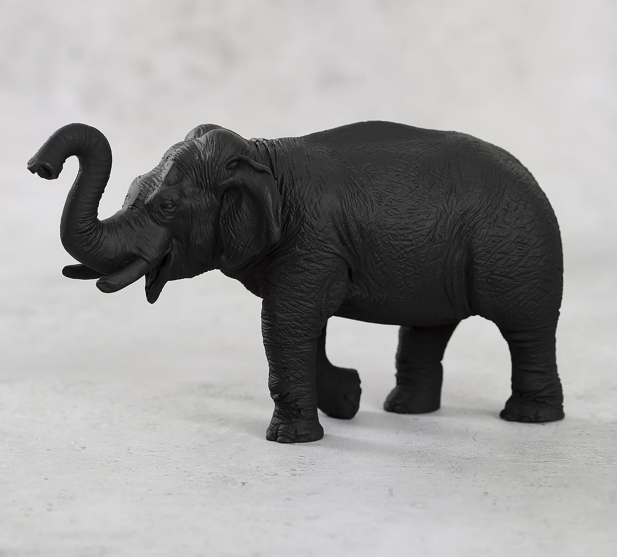 India Circus Black Baby Tusker Figurine