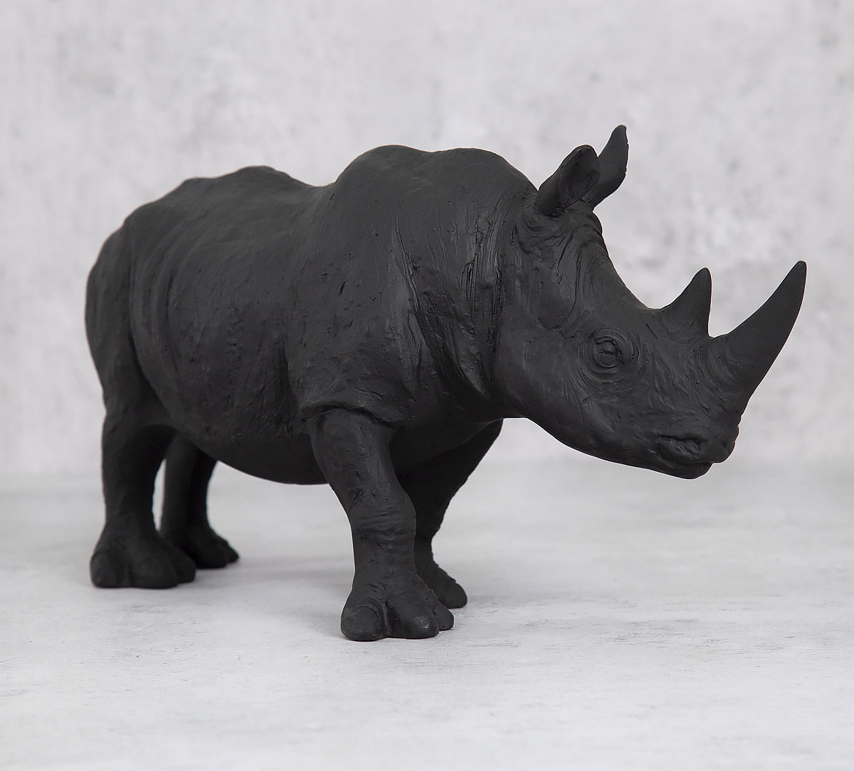 India Circus Black Rhino Calf Figurine