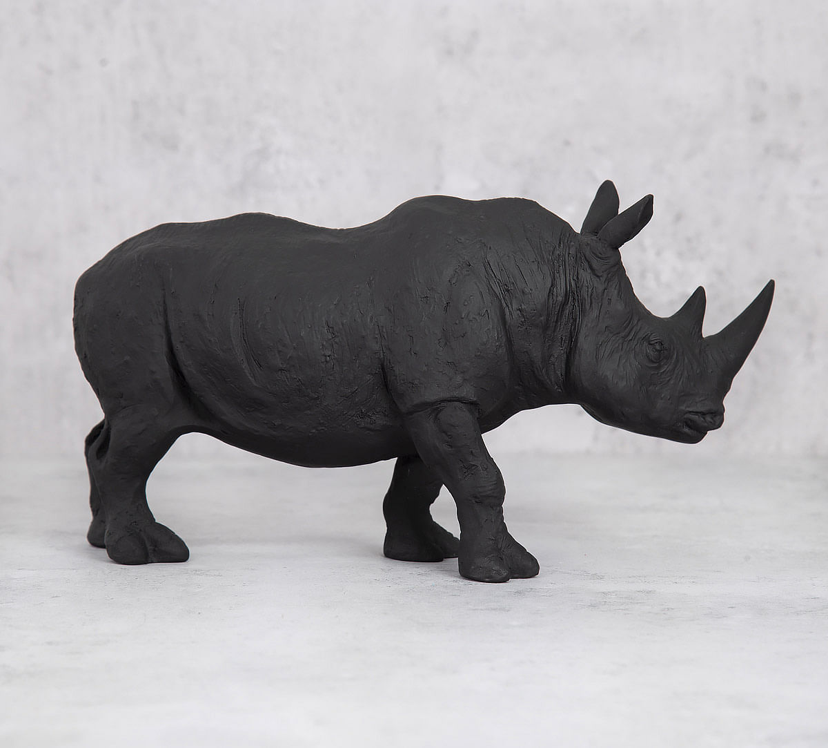 India Circus Black Rhino Calf Figurine